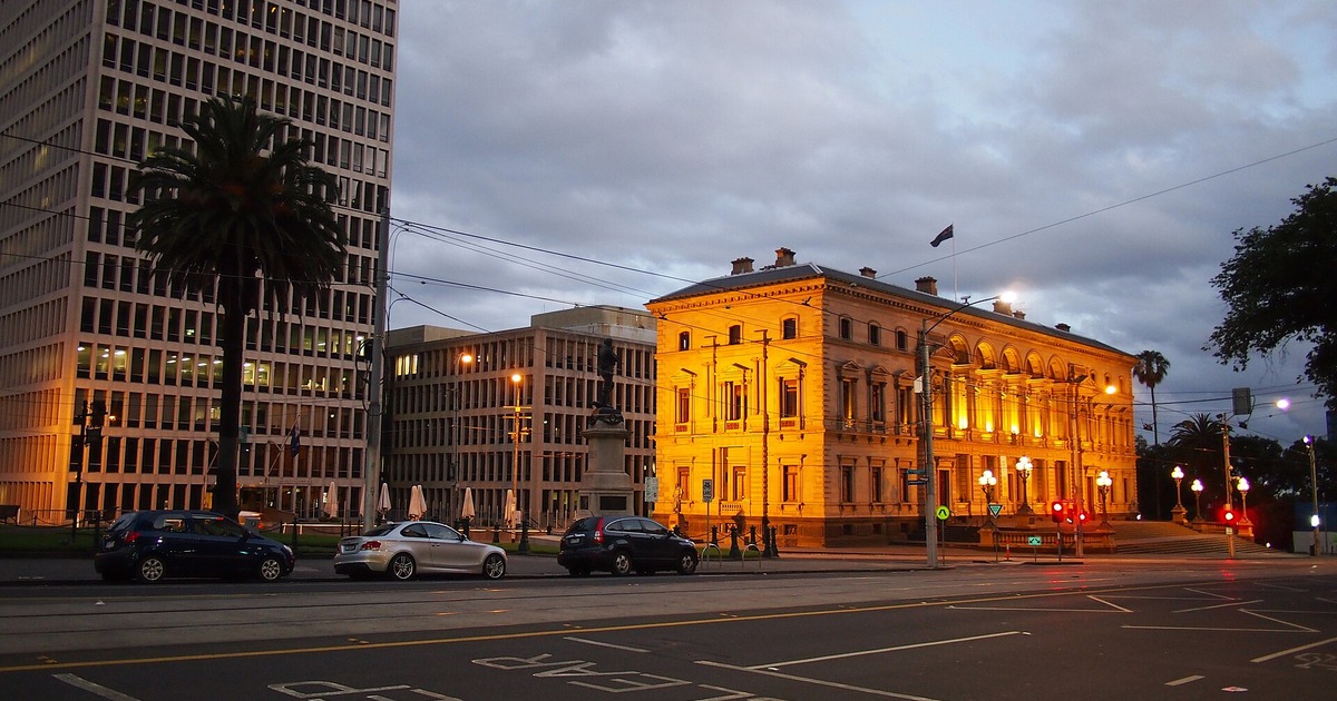Spring Street government buildings in Melbourne at night.